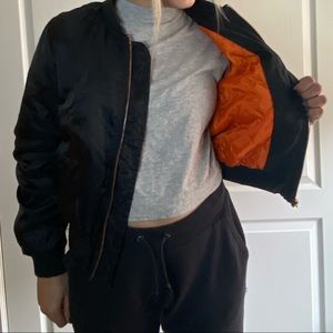 Black Lightweight Bomber Jacket with Orange Lining and Rose Gold Zippers